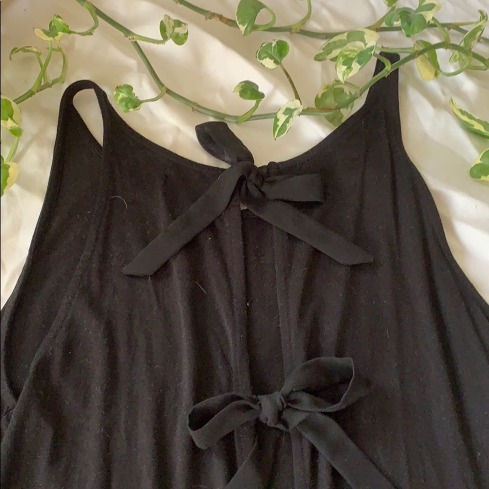 Cute peplum tank top with ribbons on the back